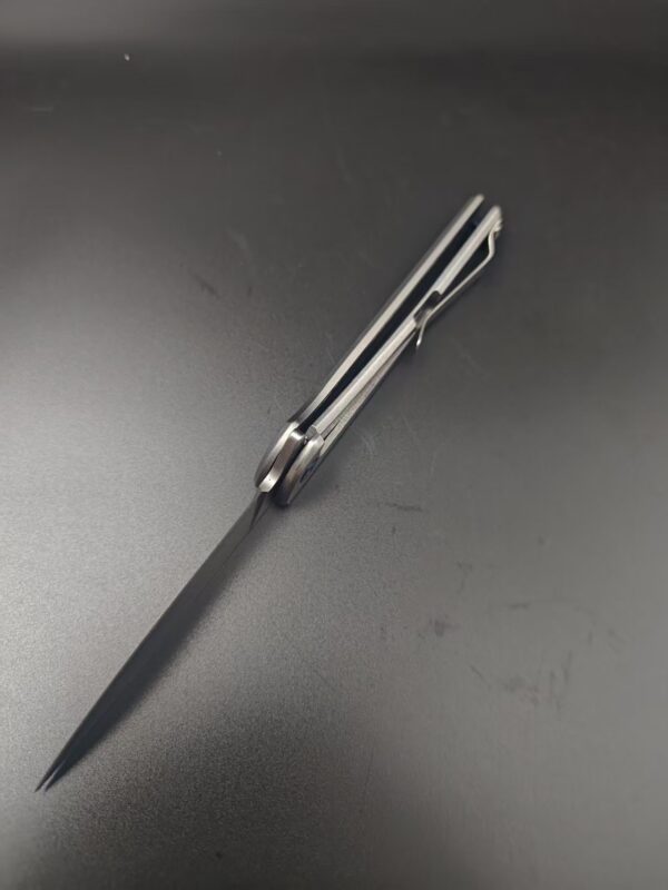 微信图片_20251028104214_147_1 Product Description A sleek, framelock folding knife that is the perfect choice for everyday carry. The 264 Cavalier pocket knife features a gray anodized aluminum handle with a carbon fiber inlay and a blue fastener. This slim knife utilizes ball bearing technology and a blade flipper for a smooth, seamless opening. A stonewashed finish, stainless steel pocket clip adds carry convenience. Closed length: 4 1/2" (11.4 cm). Imported