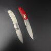 微信图片_20251028104220_152_1 Model/Item/Part - BG044. Begg - Mini Hunter Drop Point Slip Joint Knife Stainless Bolster Red Handles. 3.38" (8.59cm) closed. 2.38" (6.05cm) satin finish 14C28N Sandvik stainless drop point blade. Red G10 handle. Stainless bolster(s). Inlay shield. Black nylon zippered storage case. Boxed. Made in China. Specifications