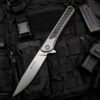 微信图片_20251028104334_209_1 Product Description A sleek, framelock folding knife that is the perfect choice for everyday carry. The 264 Cavalier pocket knife features a gray anodized aluminum handle with a carbon fiber inlay and a blue fastener. This slim knife utilizes ball bearing technology and a blade flipper for a smooth, seamless opening. A stonewashed finish, stainless steel pocket clip adds carry convenience. Closed length: 4 1/2" (11.4 cm). Imported